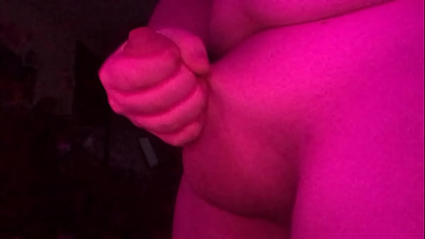 cute thick trans girl strokes fat cock in sensual lighting 