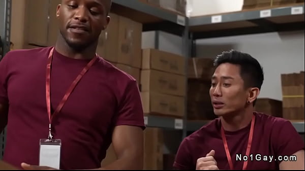 Asian worker Jkab Ethan Dale gets throat fucked by his black colleague Andre Donovan then anal fucked with his big black cock in stockroom 