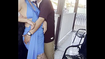 Real couple grinding and getting naughty on the balcony