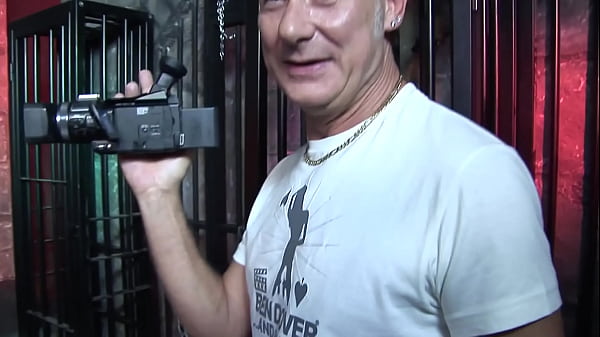 The red lights glow as this skinny blonde chick gets her hole fucked by a dude wearing a