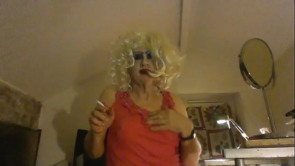 Sissy Slapper,  Cross-dressed, Sarah Millward, smoking and posing in lingerie 