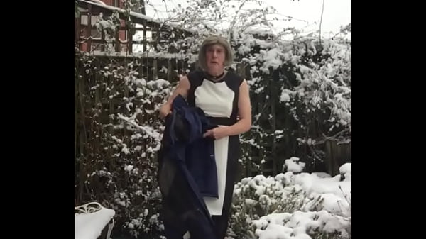 Outside in the snow - Johanna poses in dress. 