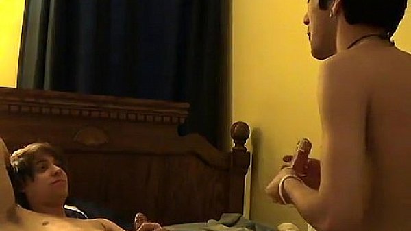 Male models Once the camera is rolling, Trace sits astride William, 