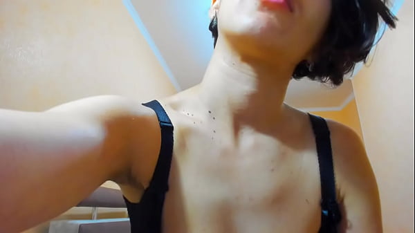 Hot brunette wears bra, plays her tits and walks naked! 