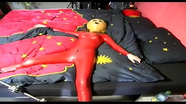 Fetishdepravation fora red latex dressed slave