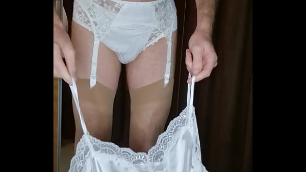 Play MP4 - Man posing in bra and garterbelt