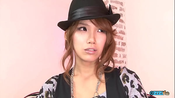 A solitary female engaging in self pleasure on a zebra patterned couch just for our observation