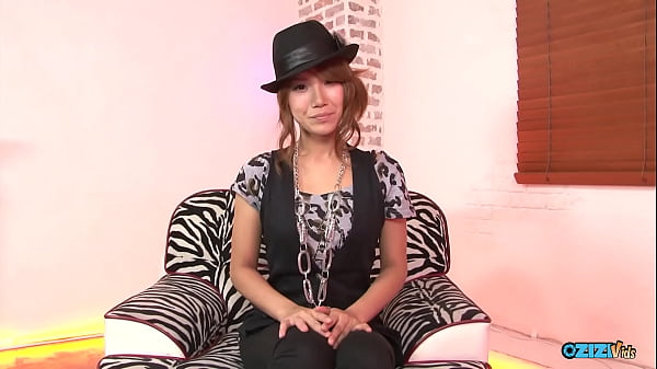 A solitary female engaging in self pleasure on a zebra patterned couch just for our observation 