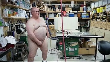 Chubby Grandpa Doing Woodworking, Naked in His Shop 