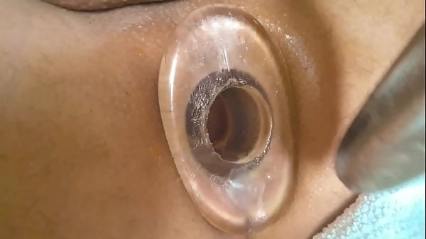 Anal tunnel plug inserted and spanking on vibrator insert