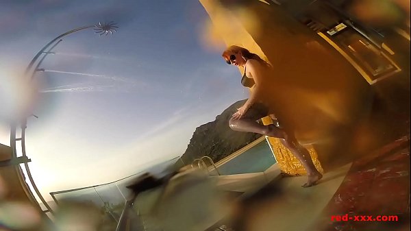 Sexy mature_Red XXX masturbates outside by the_pool