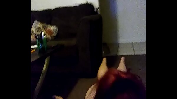 Sexy redhead giving a blowjob 