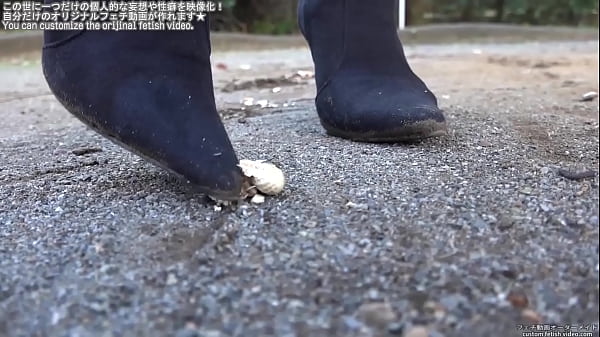 Woman Trampling Peanuts With Legs thumbnail