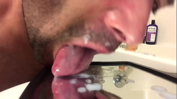 Licking up all my cum after riding my dildo 
