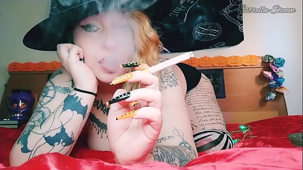 Estrellasteam Dresses As A Witch And Smokes A Cigar thumbnail