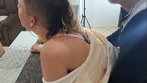 A stepdaughter is surprised while having breakfast