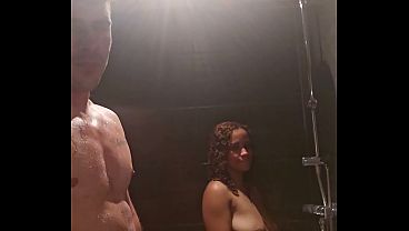 Wet couple in shower