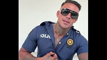 A man in police officer cosplay jerks off 