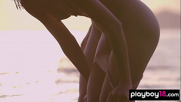 Petite brunette bikini babes stripping at_the beach