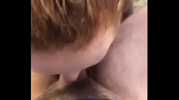 Redhead sucks cock