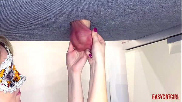 On the milking table a dick with balls pulled back by a slut who loves when male genetics hang to the knee