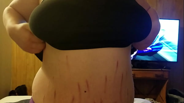 Pulling her boobs out