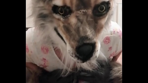 Wolf pee wearing her clothes 