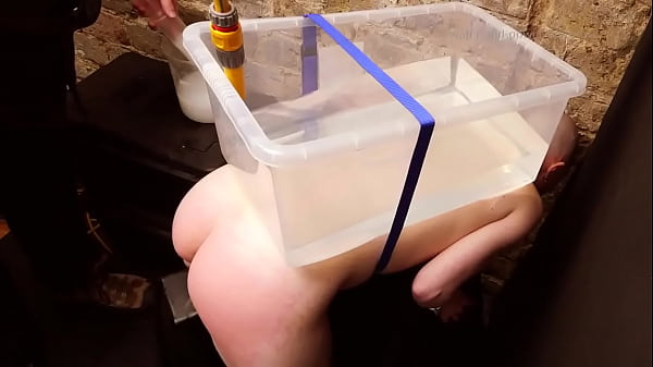 Eryn takes and enema over the workbench part 2