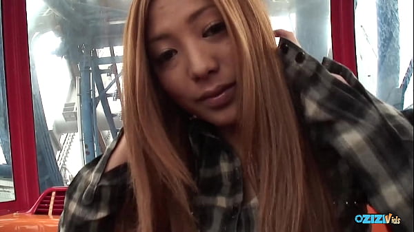 A red haired individual has her hands soiled in public