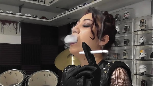 I Smoke Two Cigarettes Dressed In Latex thumbnail