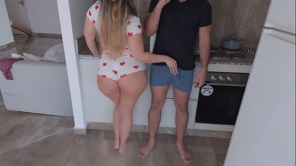 Watch my big ass stepsister teasing me in the kitchen until we fuck