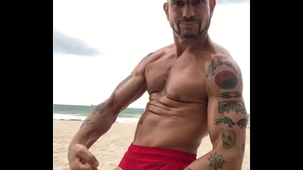 FLEXING AT THE BEACH