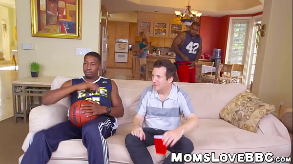 Busty milf pleasures two black dicks