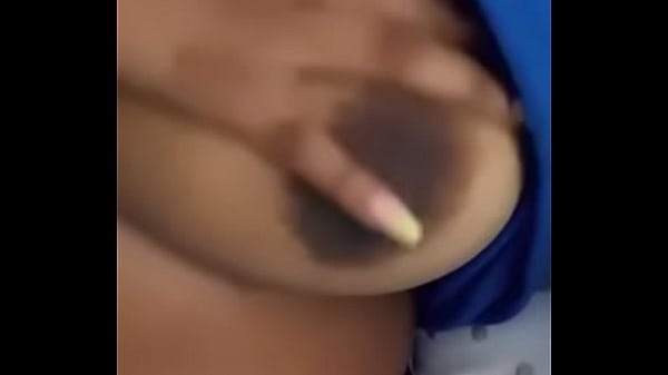 Playing wit her titties 