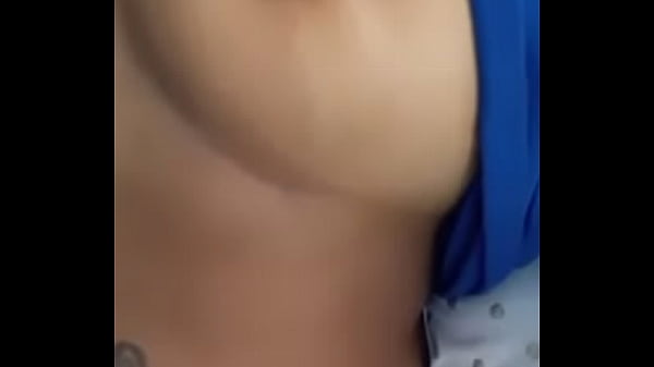 Playing wit her titties 