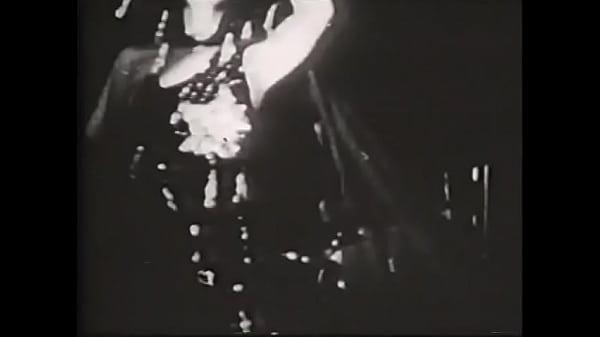 Retro beauty with a gorgeous figure dancing oriental dance 