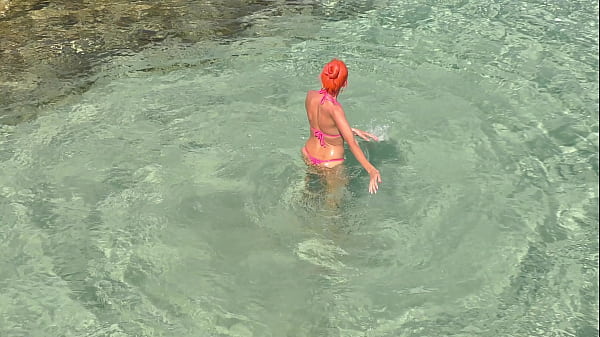 Pink bikini in a beautiful bay 
