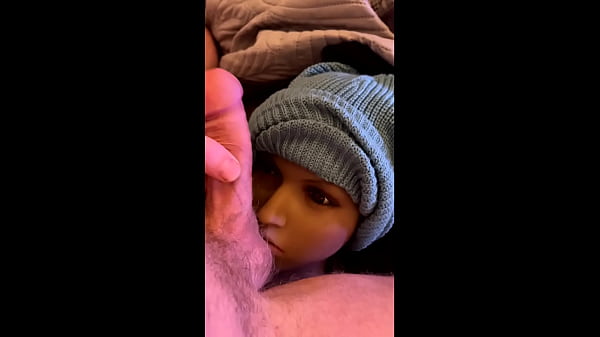 Muscular chap fucks realistic sex doll in the mouth 