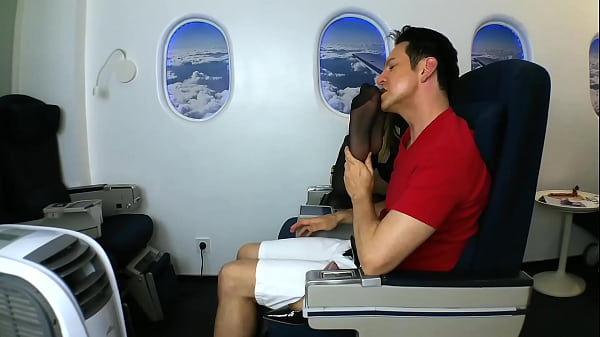 The Passanger Smell And Lick The Nylon Feet Of The Sexy Blond Young Stewardess While Fly. thumbnail