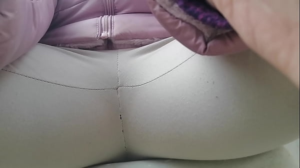 Pants completely wet with piss in a park among the people