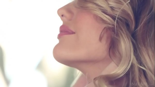 Hot young babe Kenna James undressing on the couch 