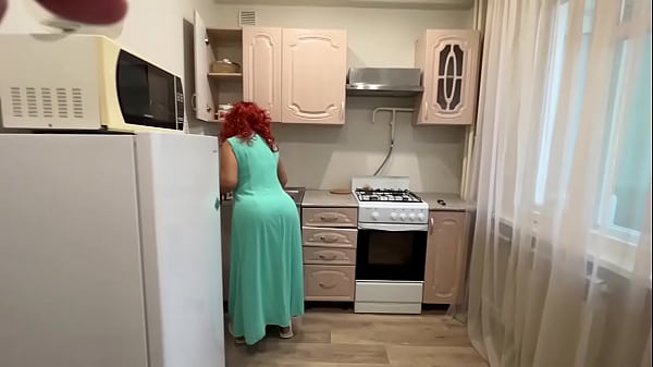 The milf knelt in front of her son in the kitchen and allowed him to insert a dick in her ass