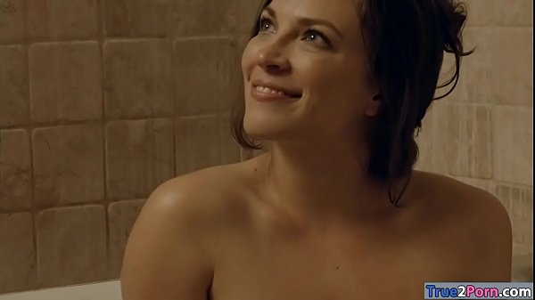 Hot brunette woman lily love is in the bathroom enjoying the bathtub