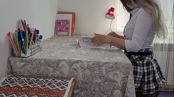 Girl Student Studying A New Book With A Teacher thumbnail