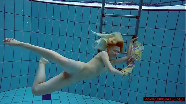 Play MP4 - Blonde in a dress in a pool