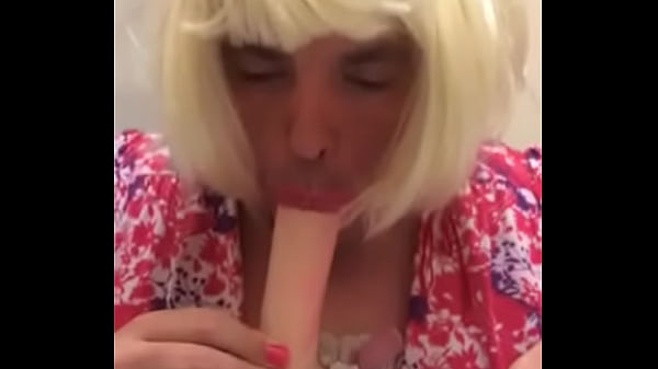 SissyBambiJones sucks a white dildo