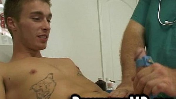 A sexy patient hunk is jerked off by the bear doctor 