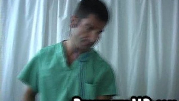 This sexy hunk doctor is performing hot oral sex 