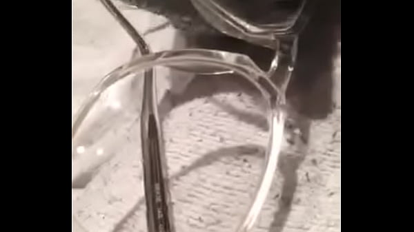 Rubbing spit and cum on a pair of thick, 2nd hand, cum addicted glasses. 