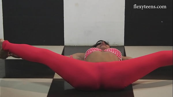 Flexible yoga babe Sofia Gnutova stretching her body 